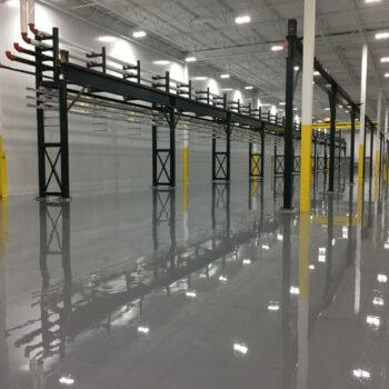 manufacturing facility in Barrie Ontario with seamless high-gloss waterproof, sparkproof electronic safety grey epoxy floors