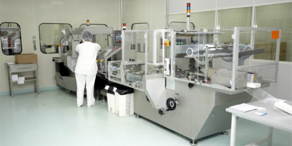 pharma research lab facility with worker on epoxy overlayment antibacterial, antimicrobial chemical-proof floors